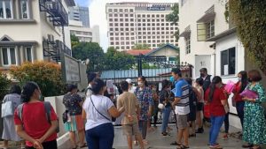 People waiting to renew their passports at the Myanmar Embassy in Singapore in 2023.